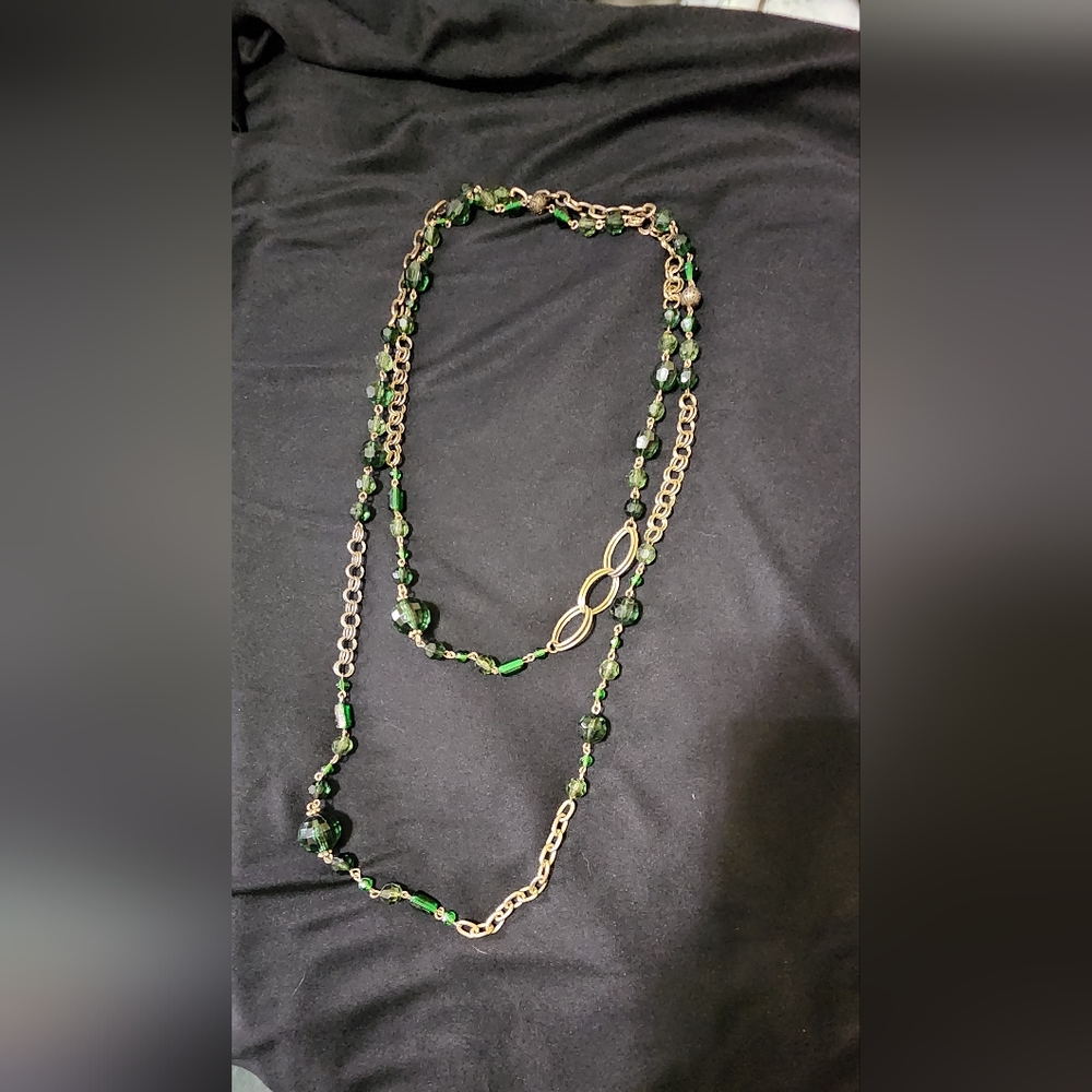 Gold tone necklace with green glass type beads